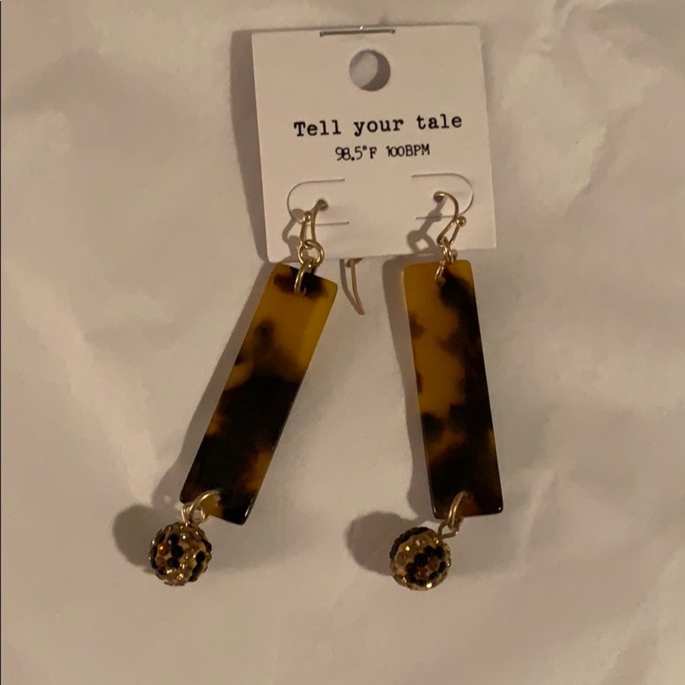Never worn earrings!